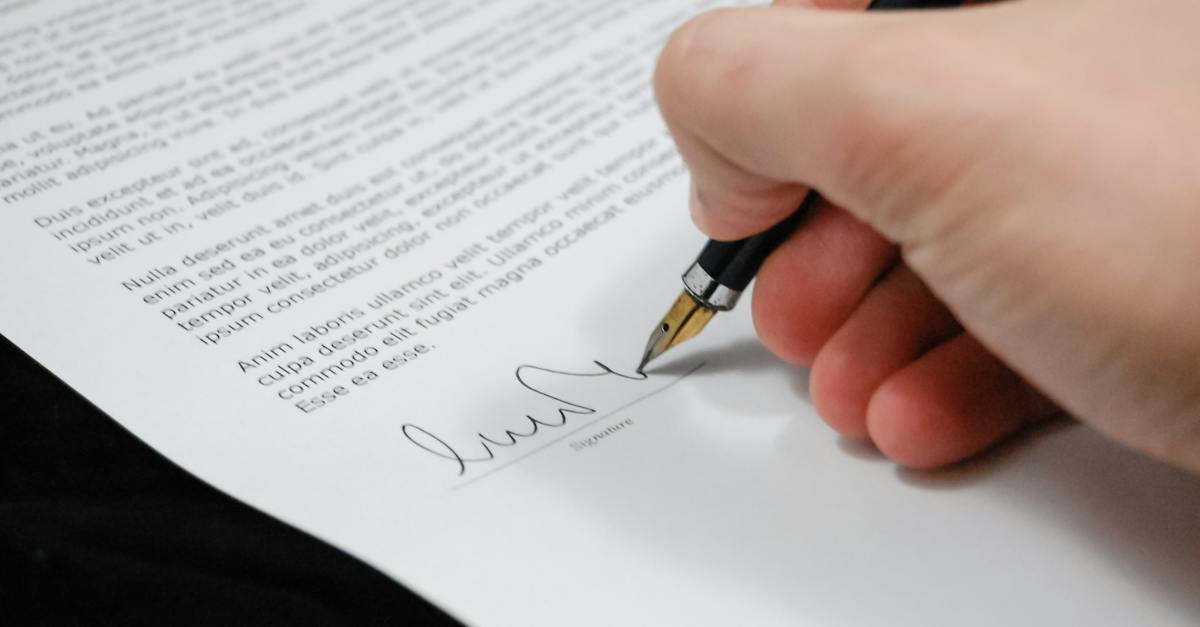 Person Signing in Documentation Paper