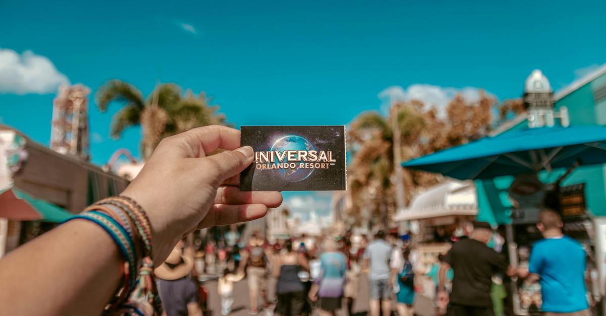 Person Holding Universal Studios Ticket