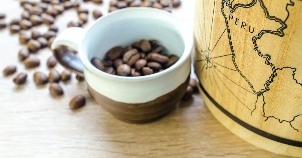 Round White and Brown Mug With Coffee Beans
