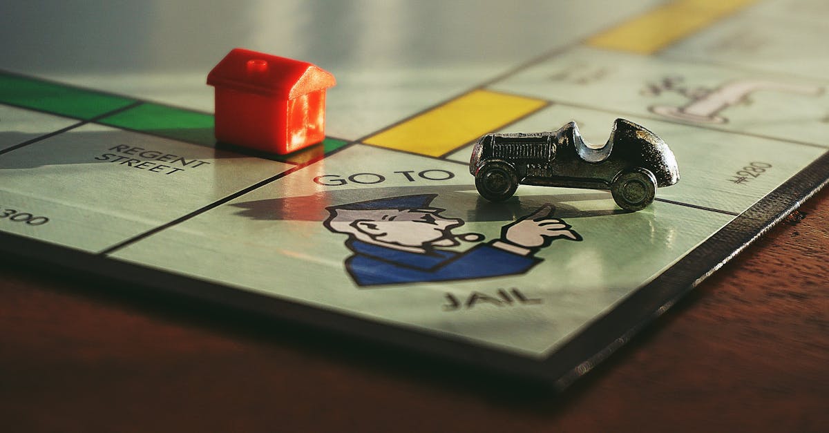 Miniature Toy Car on Monopoly Board Game 