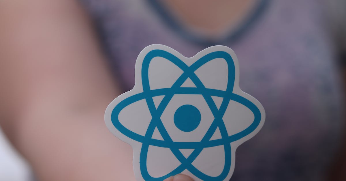 Hand Holding React Sticker