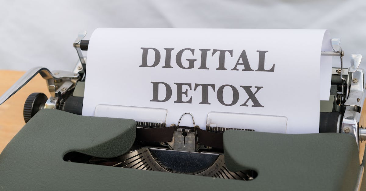 A typewriter with a paper that says digital detox