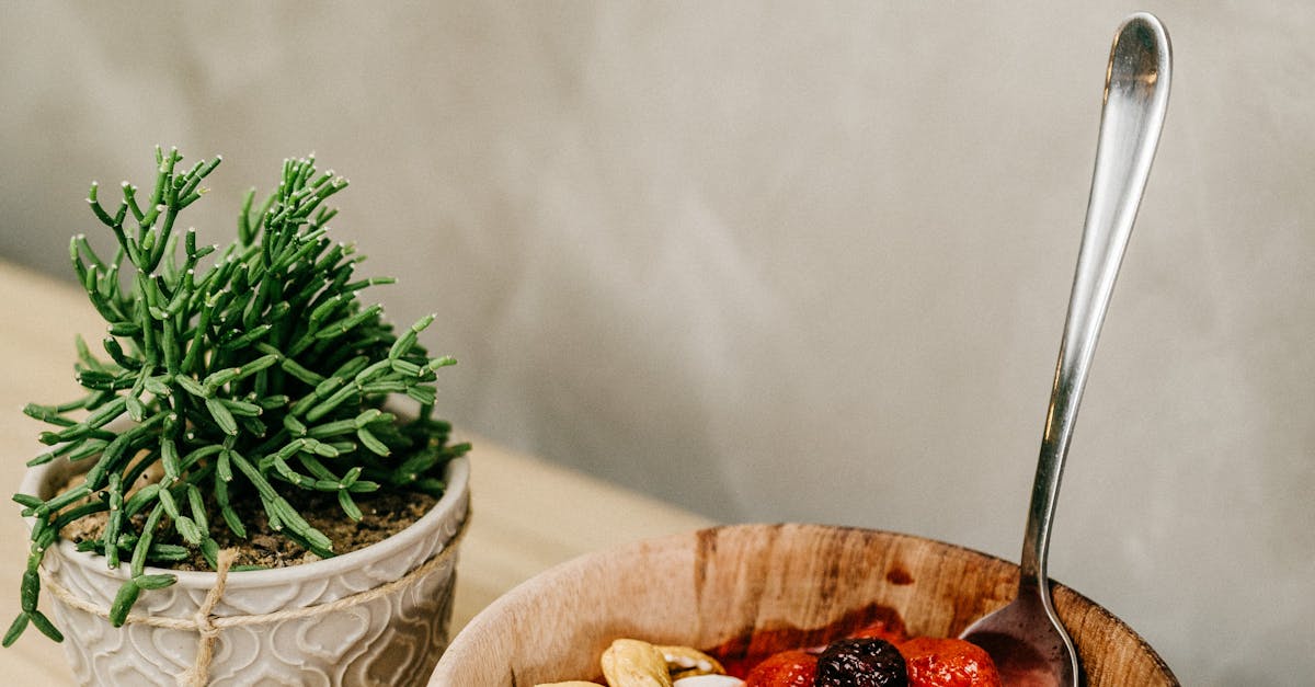 Sliced Berries and Cashews in Wooden Bowl