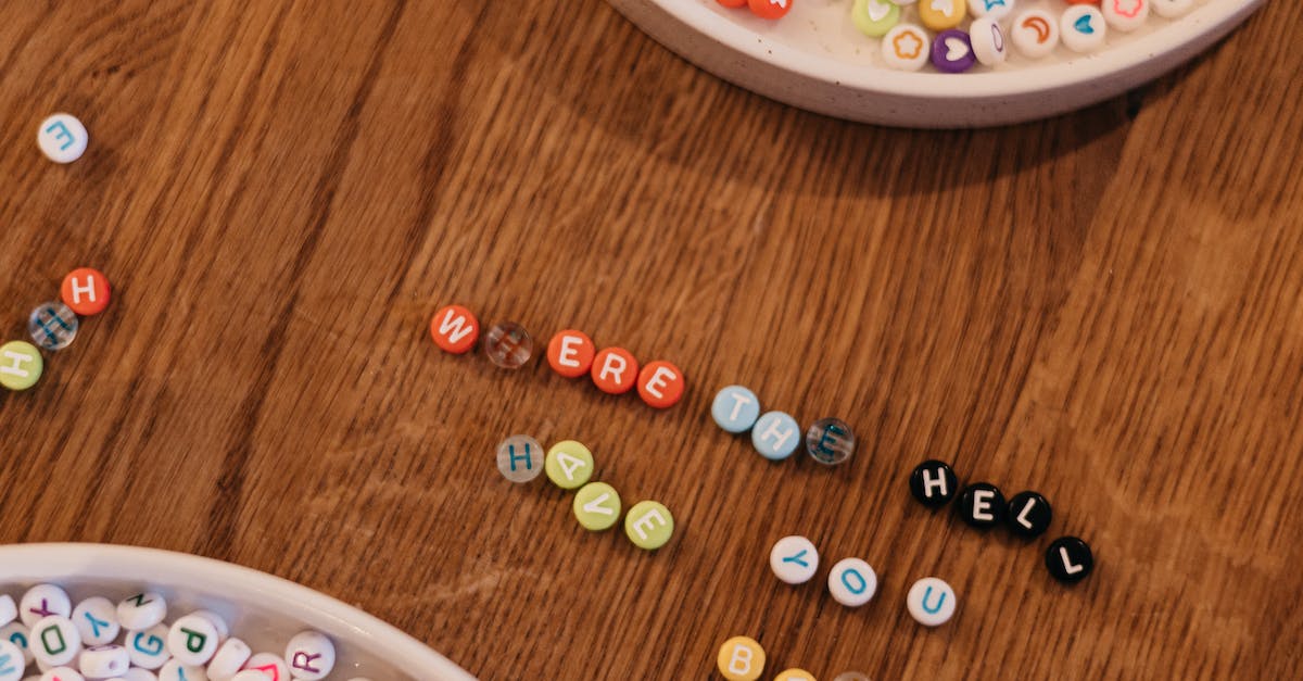 A table with a bowl of beads and a bowl of beads